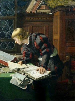 A young man researching some documents